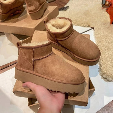 StrideLux™ - Classic Leather Mini Boots for Timeless Style